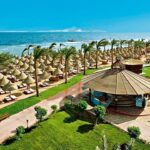Sharm Grand Plaza Resort w Sharm el Sheikh, hotel 5 gwiazdek z rafą, pomostem, lazy river, plażą przy hotelu i All Inclusive z Katowic dla 2+1